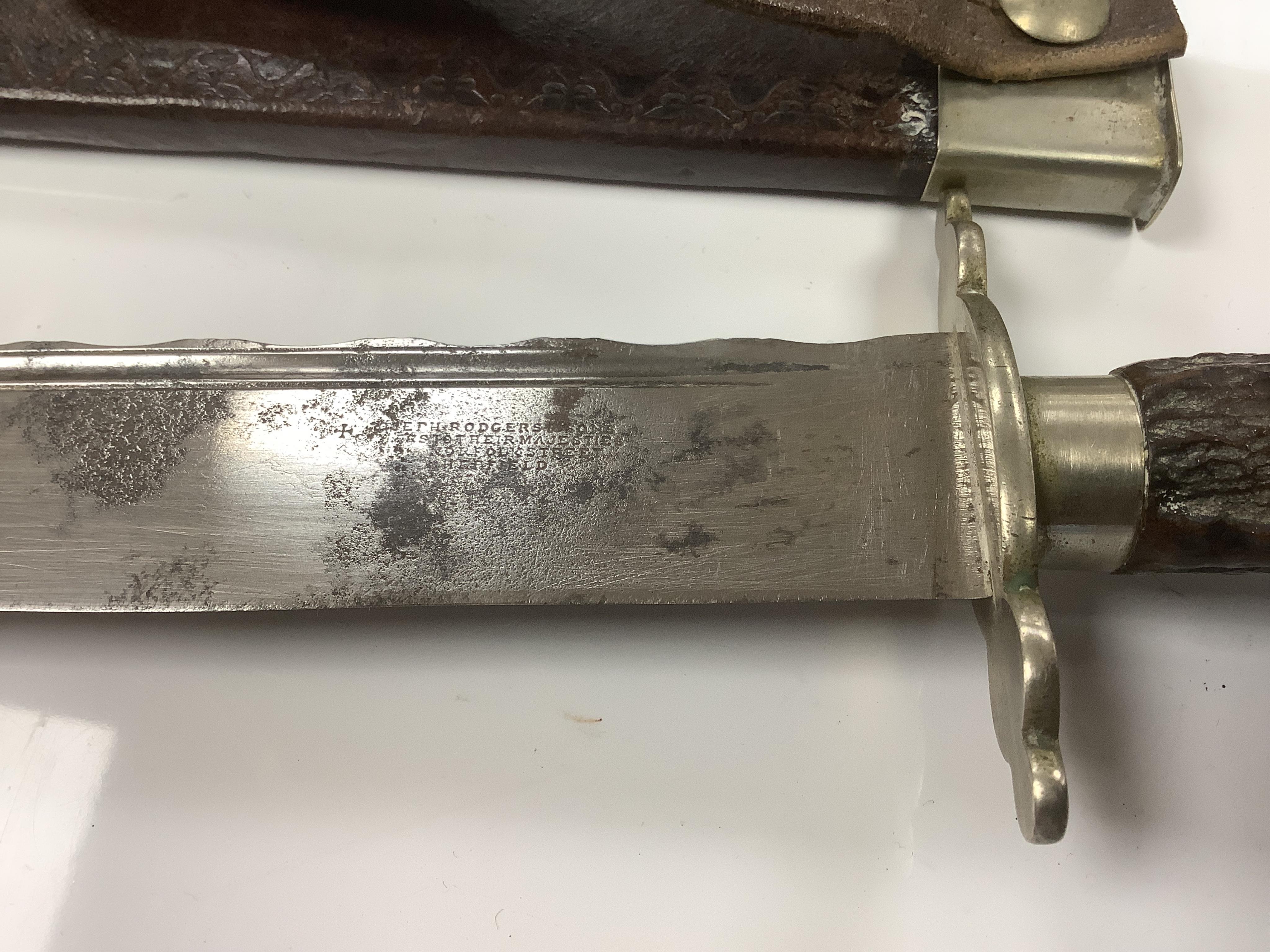 A staghorn handled Bowie knife, the blade stamped Joseph Rodgers and sons, cutlers to their Majesties, Norfolk Street, Sheffield